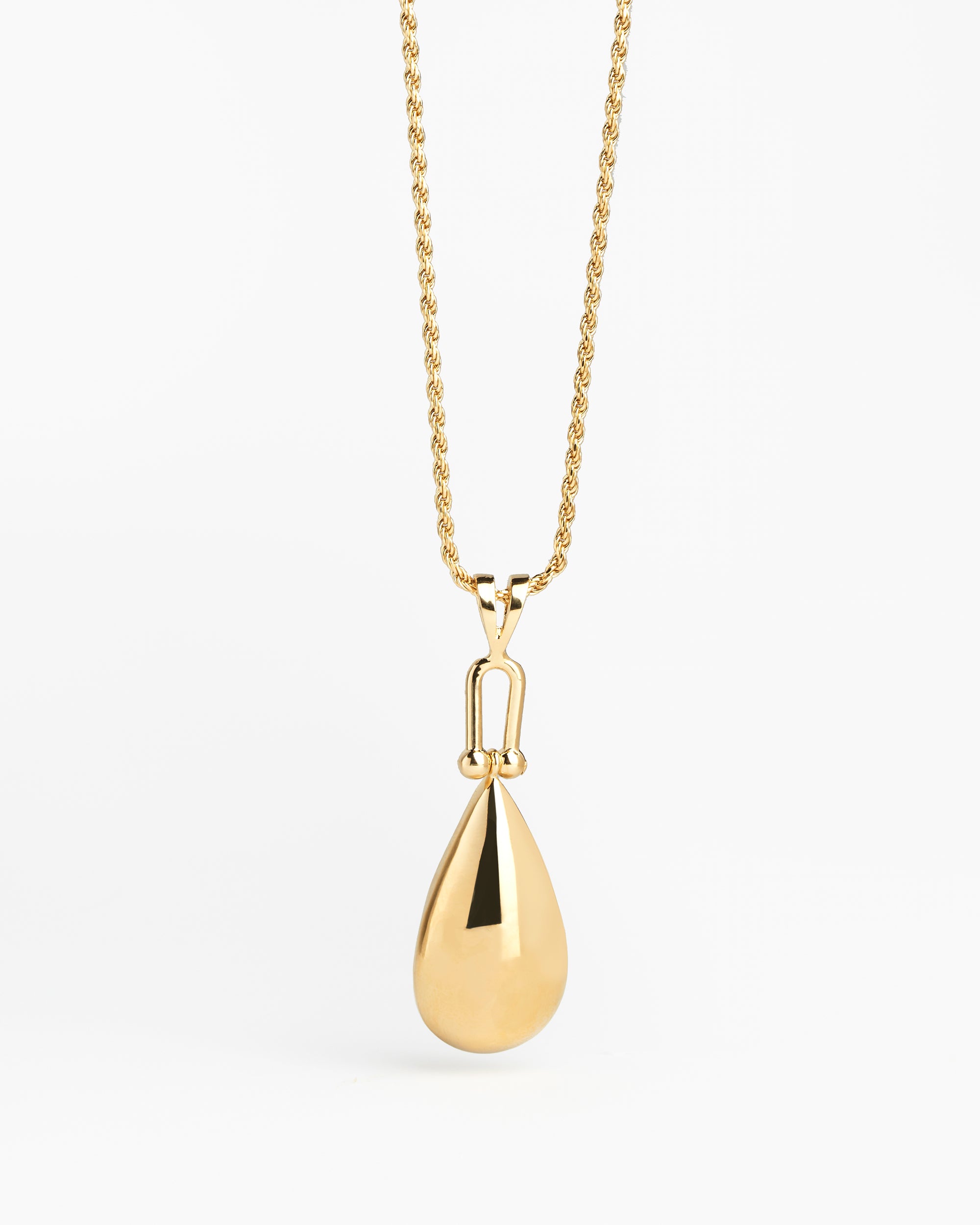 Gold tear drop pendant on a chain